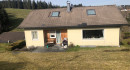 Rückwärtige Ansicht Haus Beer mit Garten und Terrasse